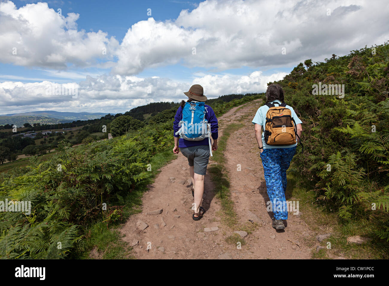 Two female walkers on track to Sugar Loaf mountain, Abergavenny, Wales, UK Stock Photo