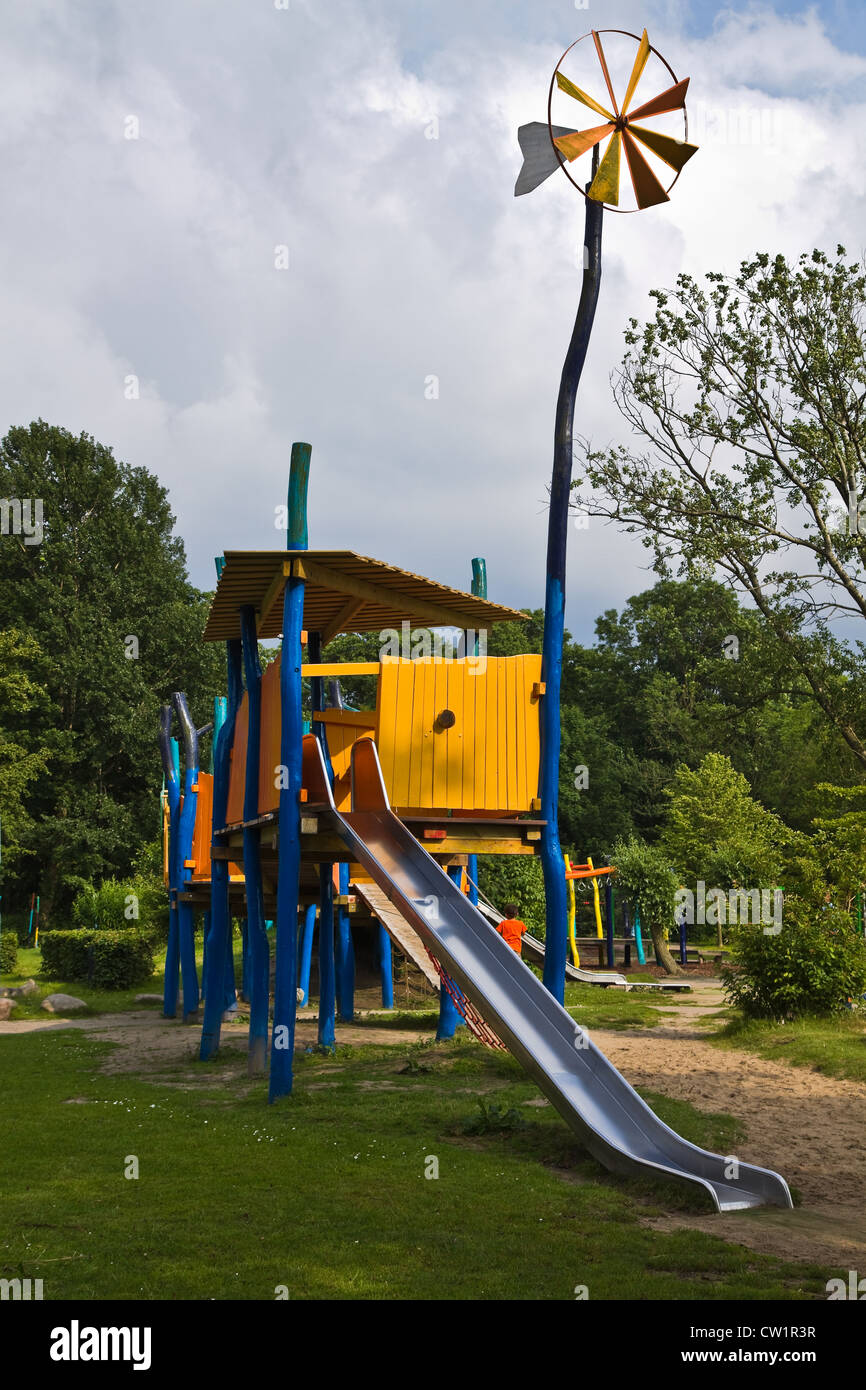 Playground for children with slidings in public park Stock Photo