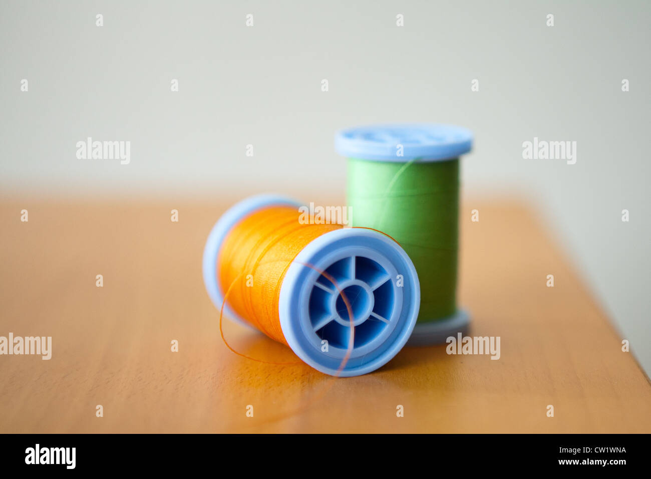 Colorful spools of sewing thread Stock Photo