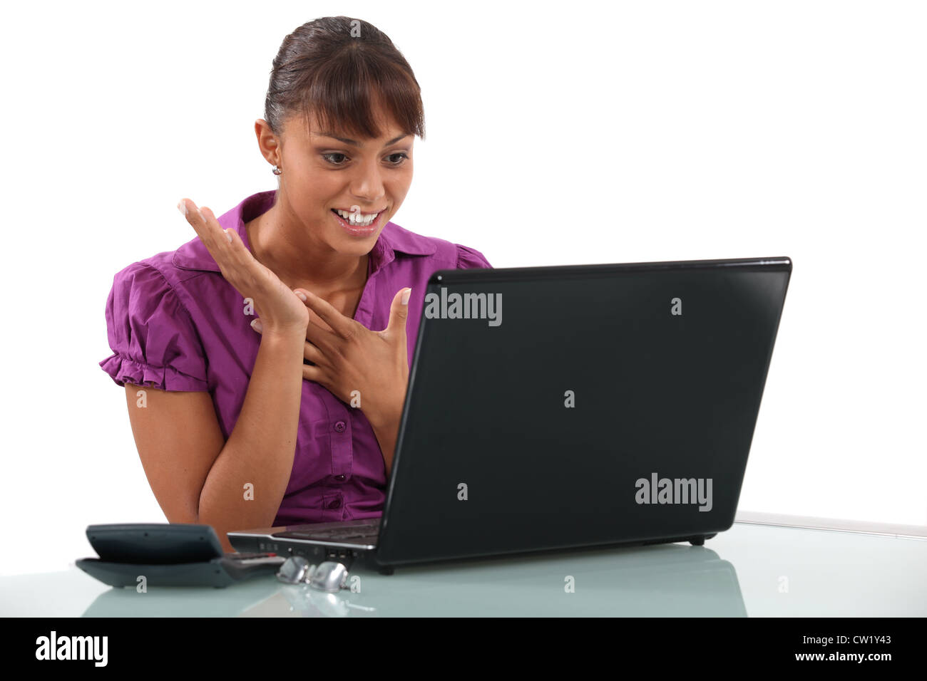 Happy woman at the computer Stock Photo