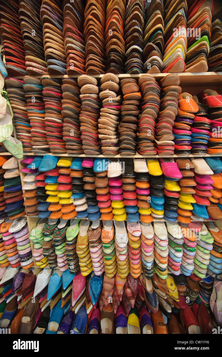 leather babouche slippers for sale in the souks of the ancient medina of Fes, Morocco Stock Photo