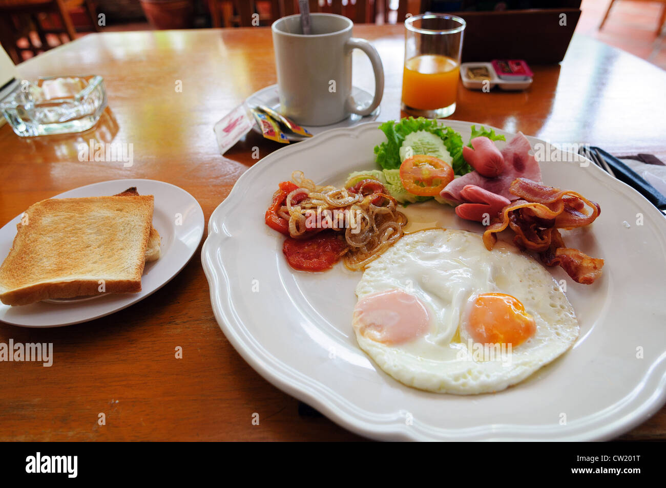 american breakfast on a table in Thai cafe Stock Photo