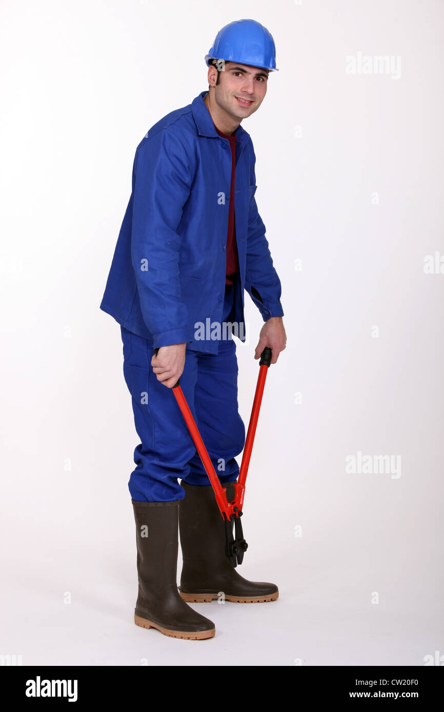 Man holding bolt cutters Stock Photo Alamy