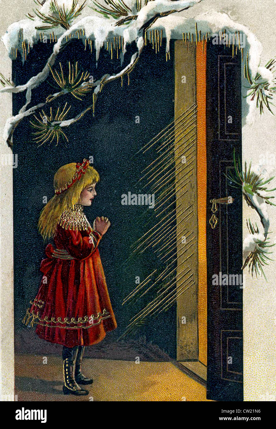 Girl standing in front of a door Stock Photo
