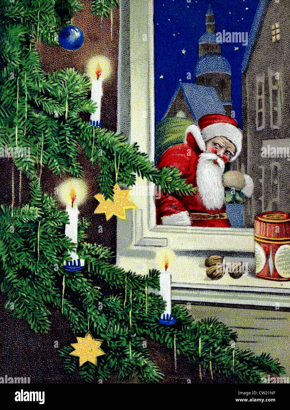 Santa Claus looks through a window Stock Photo