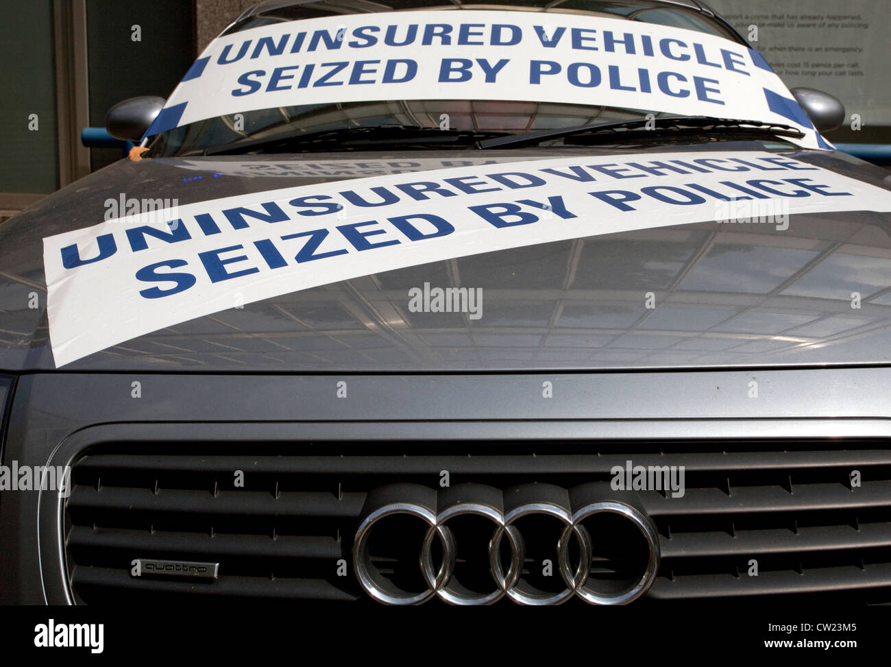 Uninsured car seized by police on display outside New Scotland Yard, London Stock Photo