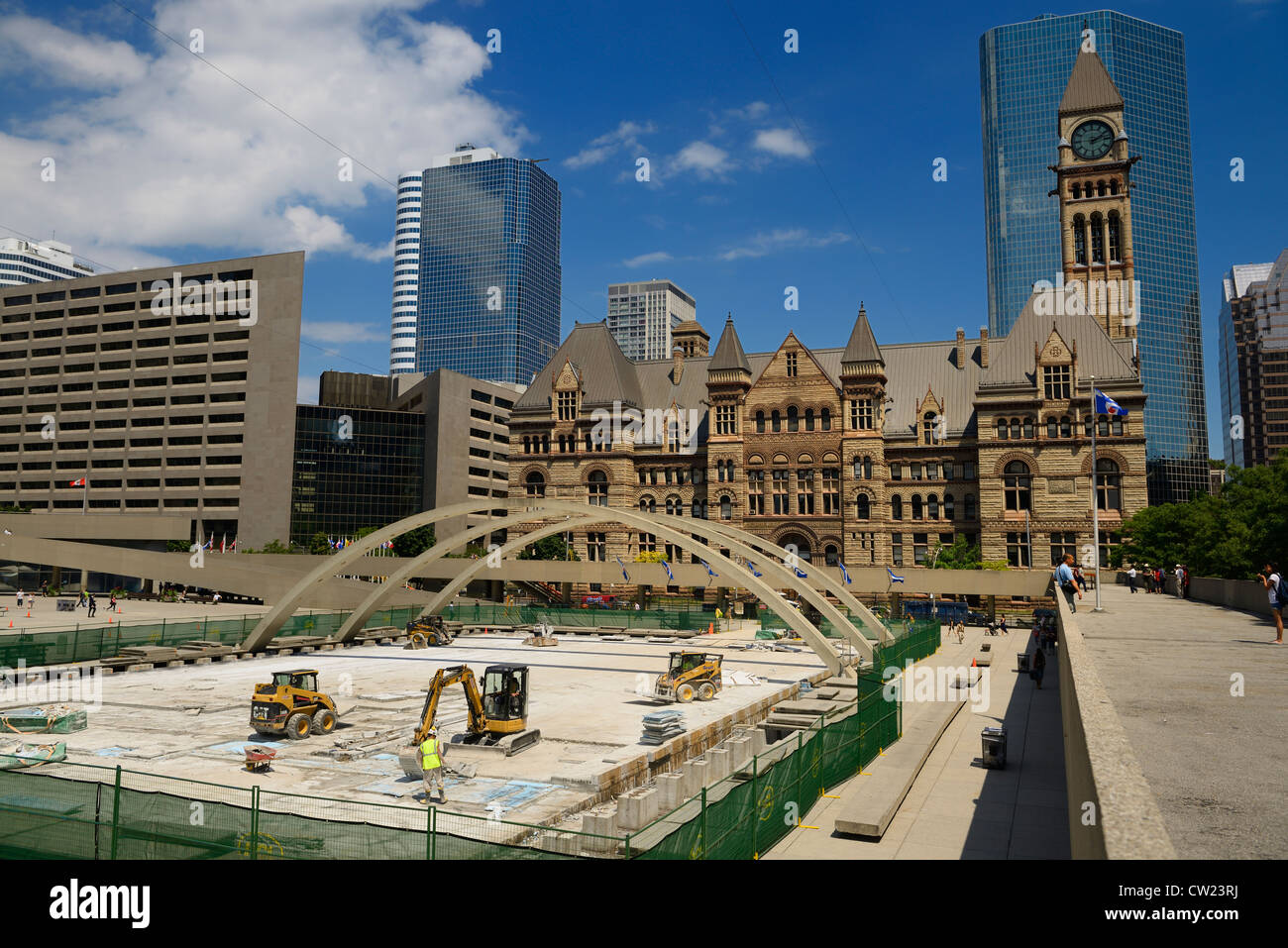 Reconstruction of the reflecting pool and winter skating rink at Nathan Philips Square Toronto Canada with Old City Hall Stock Photo