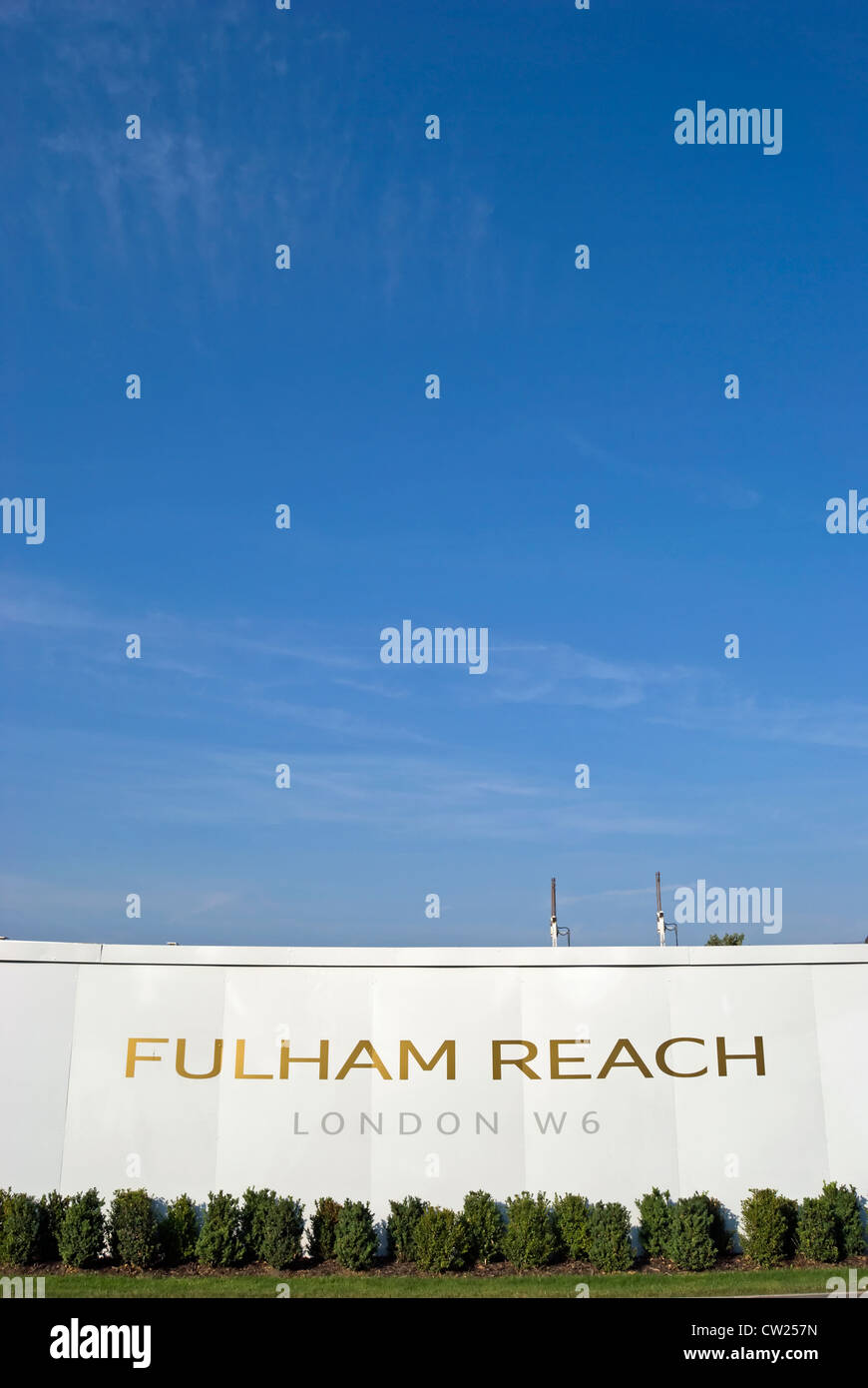 temporary hoardings concealing a construction site for fulham reach, a series of luxury riverside apartment blocks Stock Photo