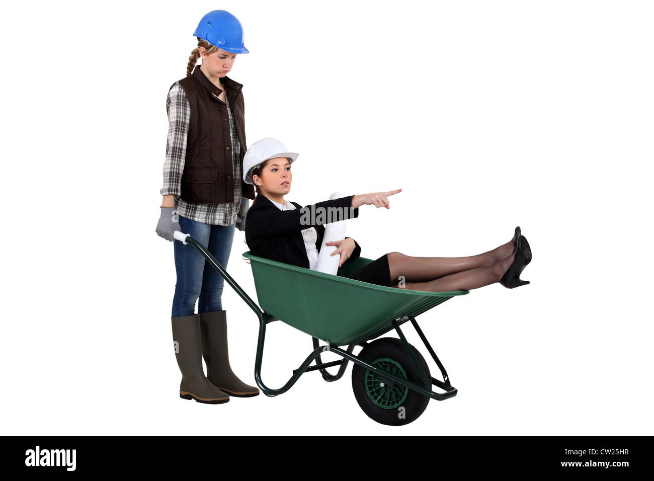 Woman laborer and businesswoman in a wheelbarrow Stock Photo - Alamy