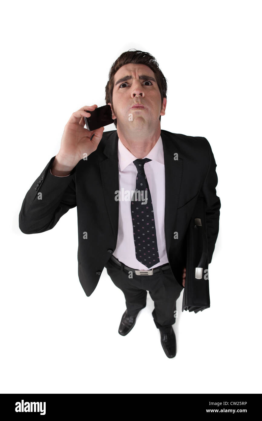 Businessman taking a bad phone call Stock Photo Alamy