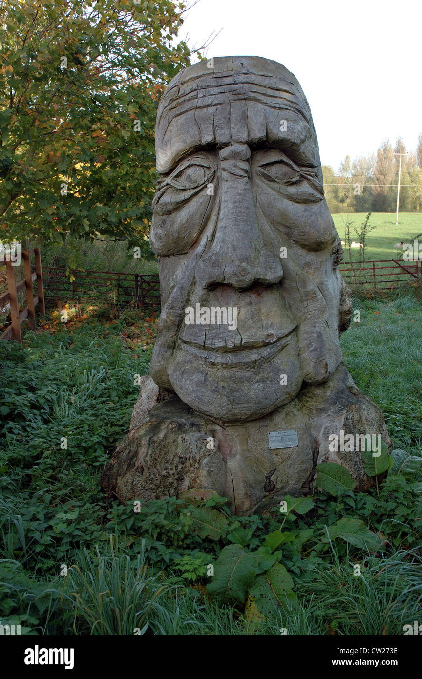 Big Head tree sculpture near Eye, Suffolk, UK Stock Photo