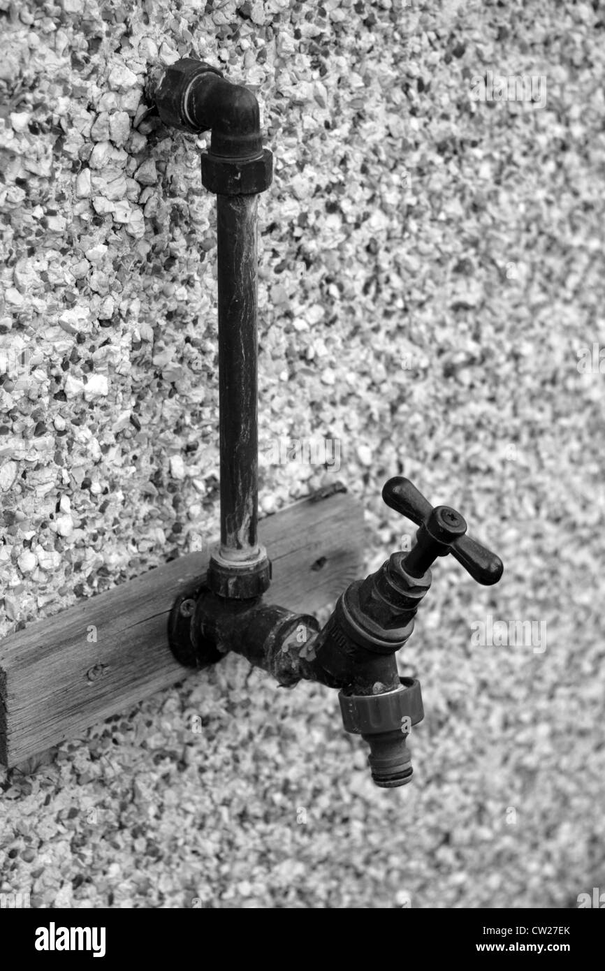 Wall mounted outdoor garden tap Stock Photo