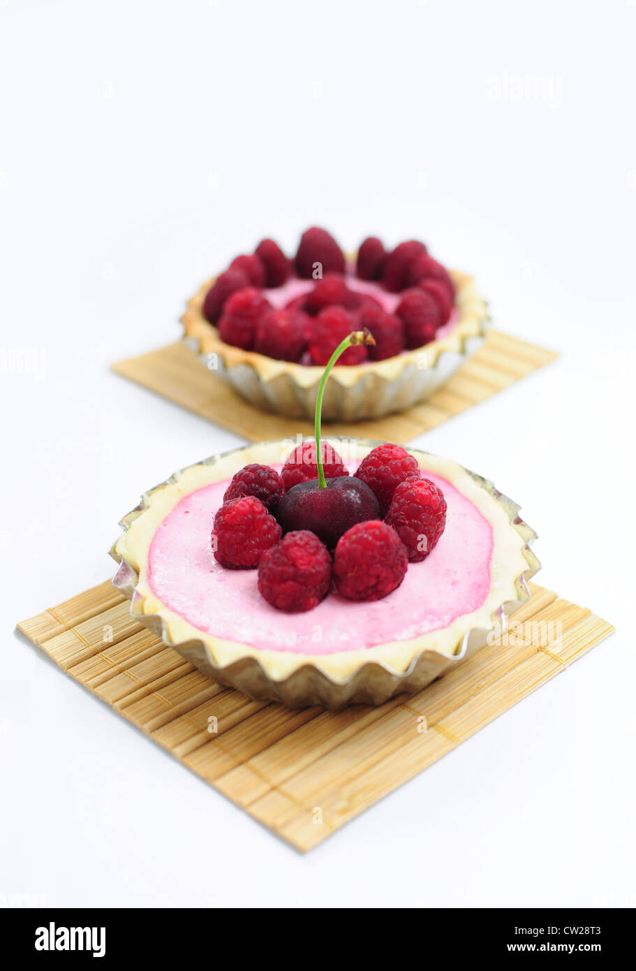 Two Tarts With Cherries And Raspberries Stock Photo - Alamy