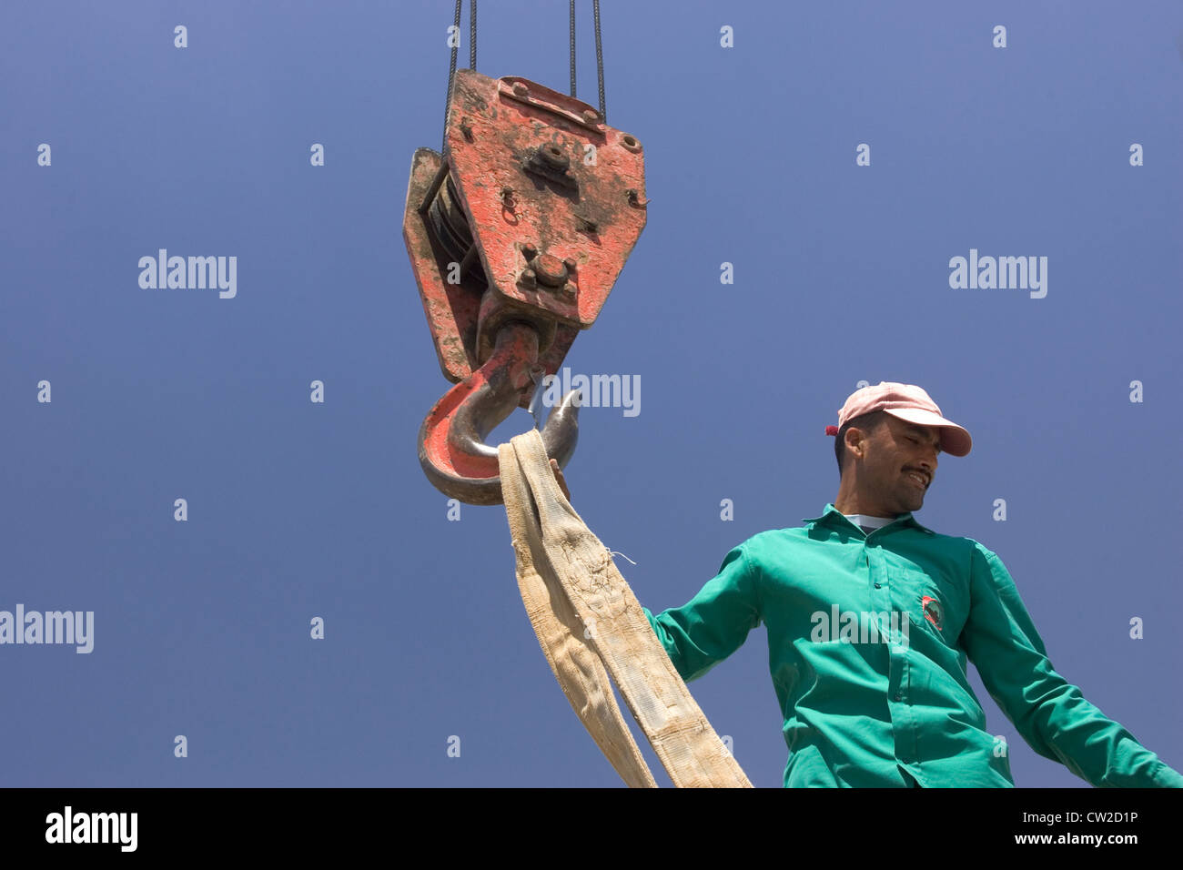 Dubai, a construction worker on a construction site Stock Photo