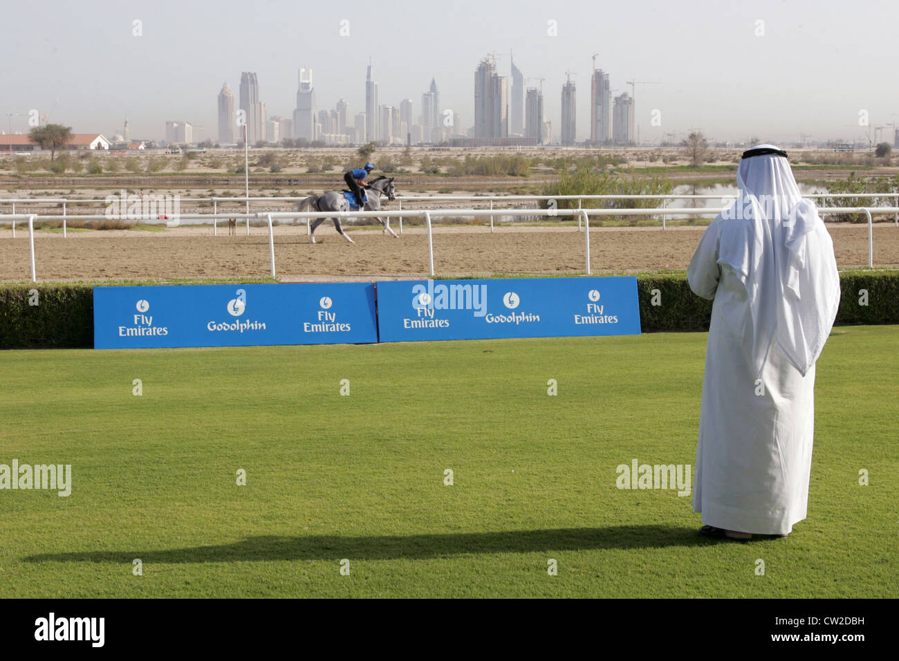 Dubai, morning workout at Al Quoz Stables in Dubai. A sheik watched his horse Stock Photo