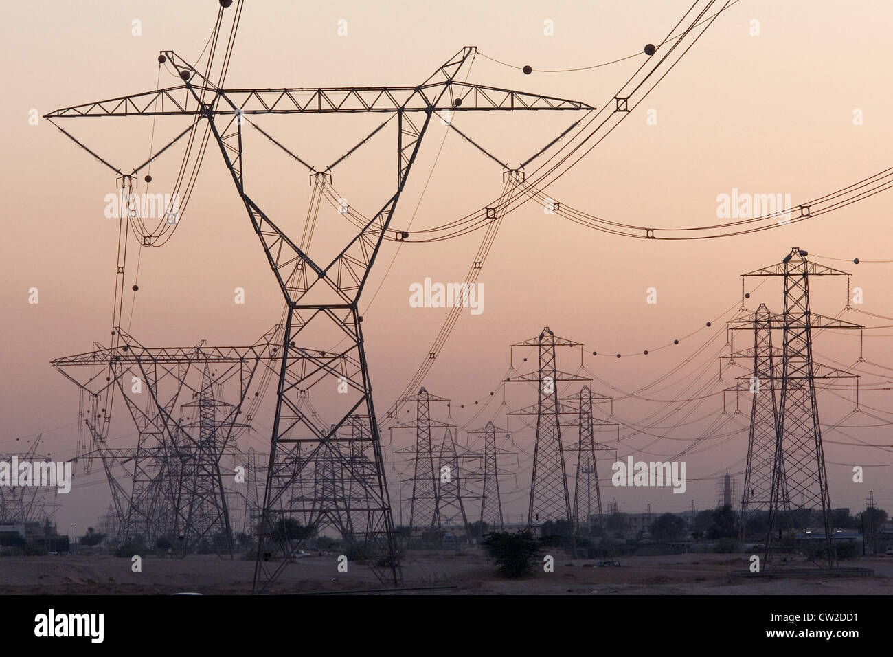 Dubai, electricity pylons in the desert Stock Photo Alamy