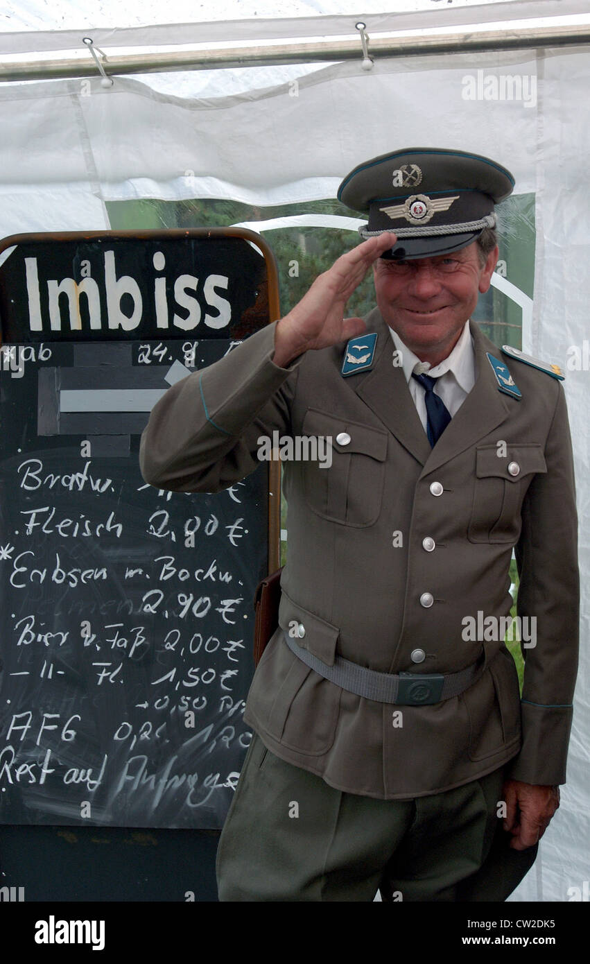 Snack bar with former NVA officer Stock Photo