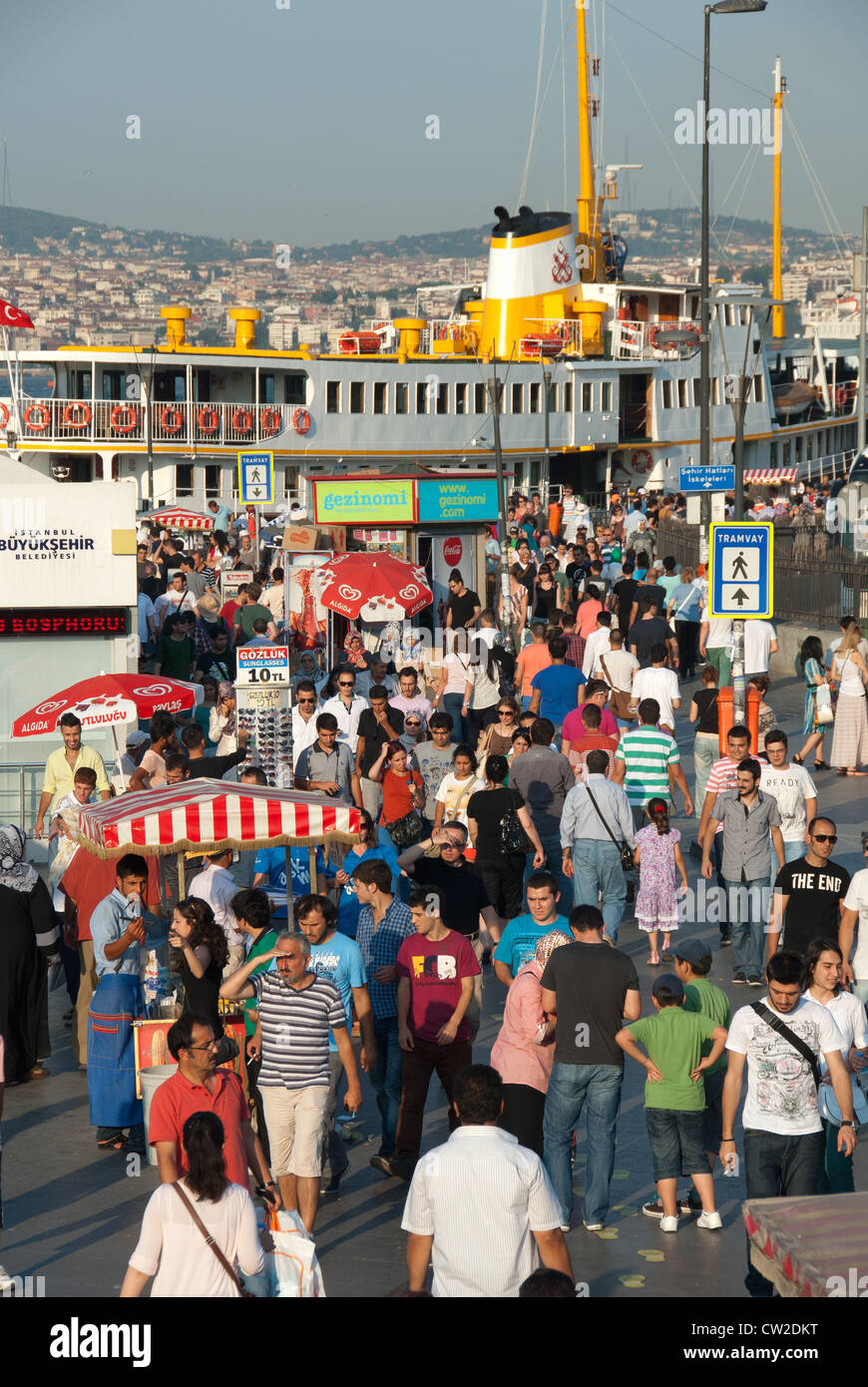 ISTANBUL, TURKEY. A lively and colourful scene at Eminonu ferry terminal on the Golden Horn. 2012. Stock Photo