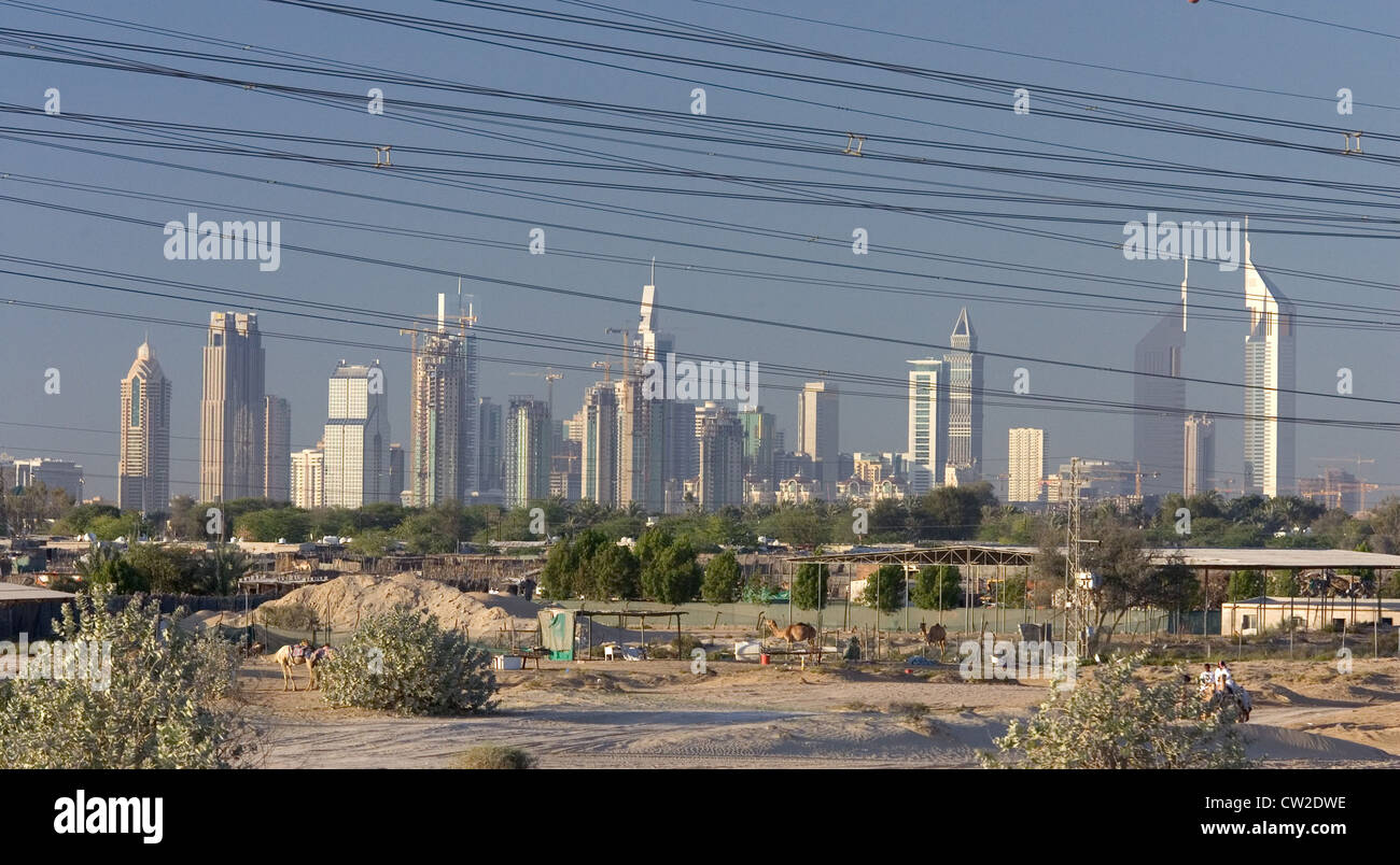 Dubai, energy demand - the city skyline and power cable Stock Photo
