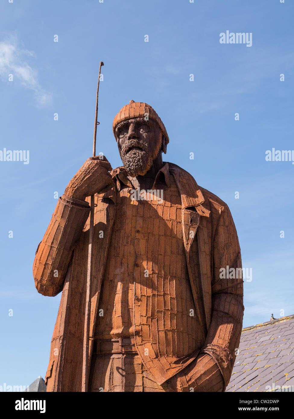 Filey Yorkshire UK Metal figure of The Filey Fisherman by Ray Lonsdale on the seafront Stock Photo