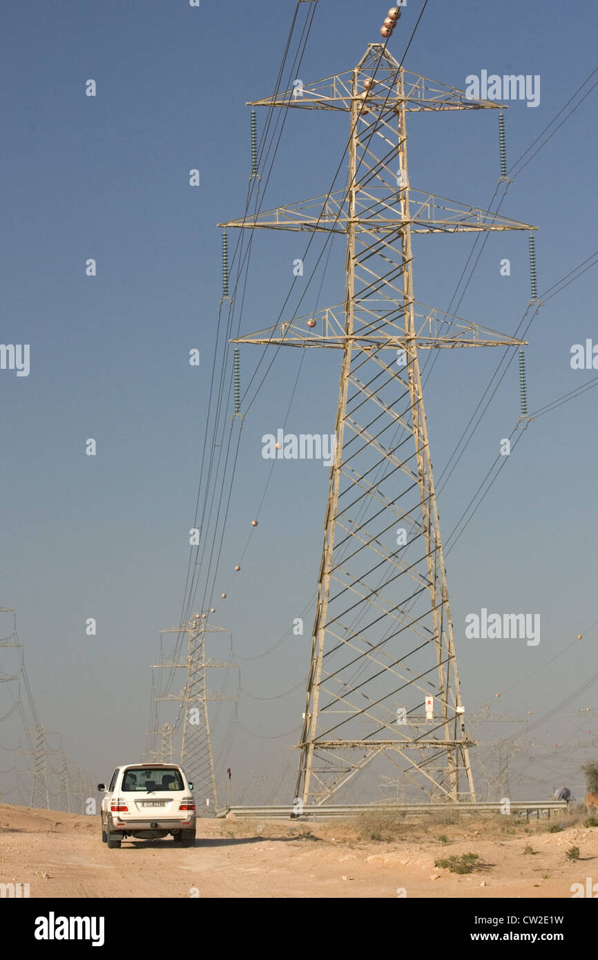 Dubai, electricity pylons in the desert Stock Photo