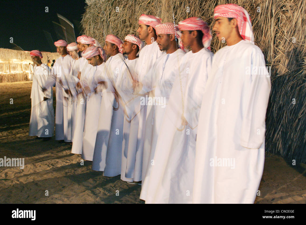 Dubai, traditional dance at a festival in the desert Stock Photo Alamy