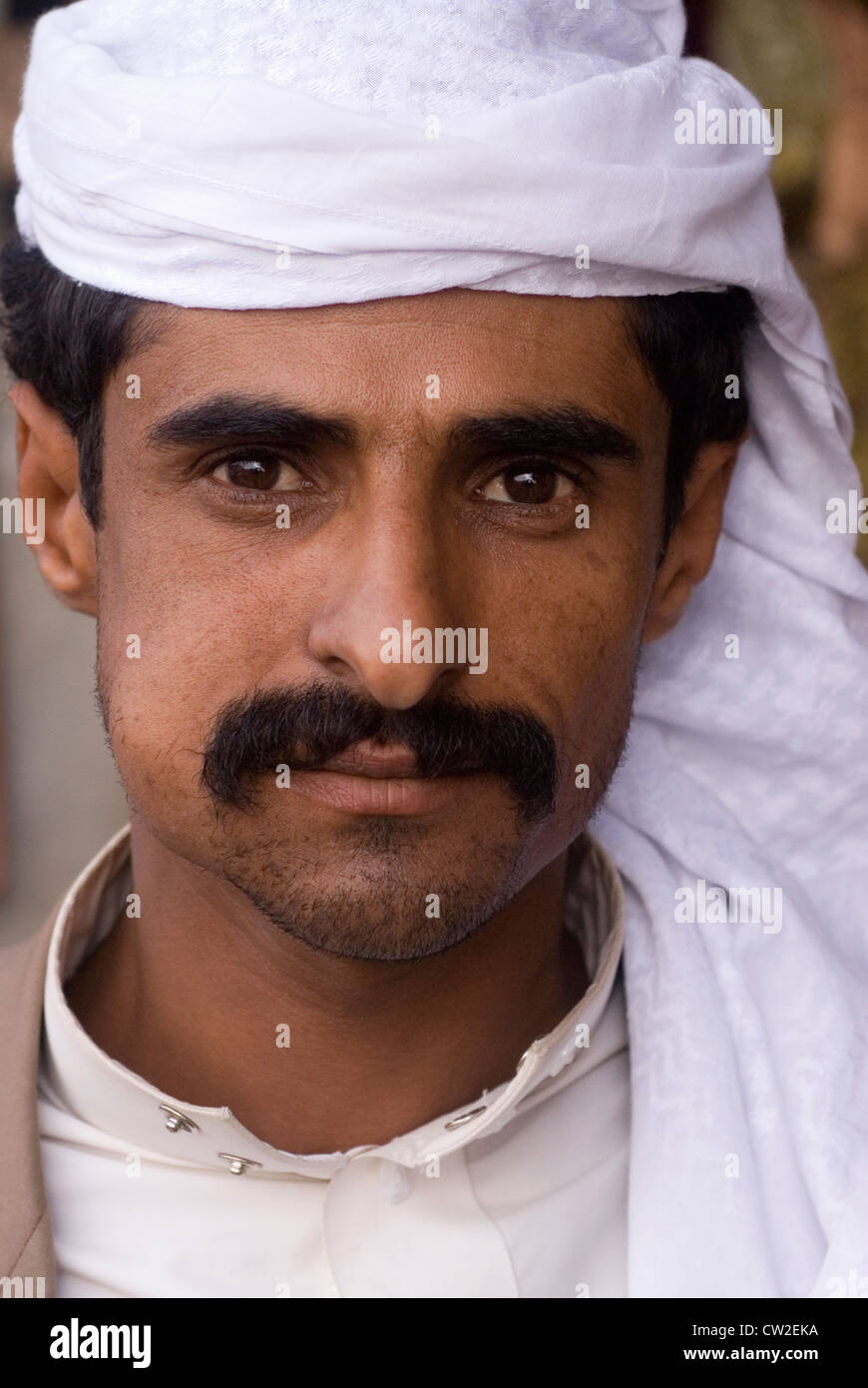 Man chewing Qat in Bab Al Yemen in the city of Sana'a, a UNESCO World Heritage Site, Yemen, Western Asia, Arabian Peninsula. Stock Photo