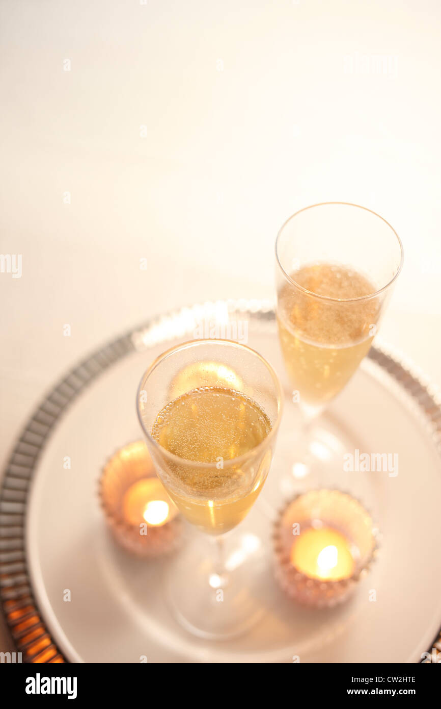 Candles and champagne Stock Photo