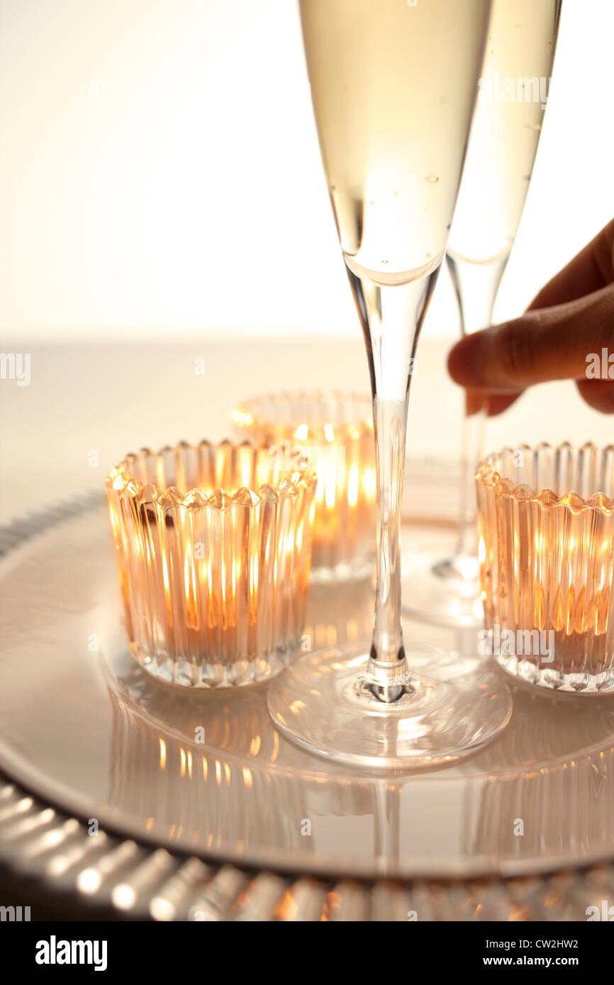 Candles and champagne Stock Photo