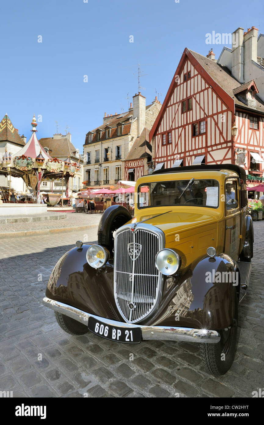 Old car, carousel and architecture in Dijon, France Stock Photo Alamy