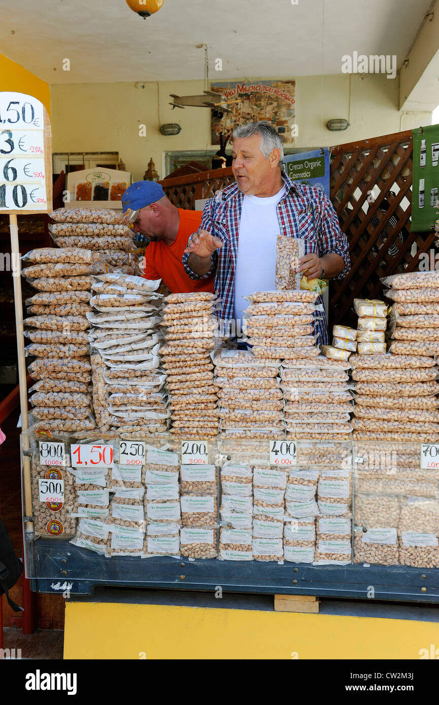 Merchant selling nuts Oia Santorini Greece Island Mediterranean Cruise