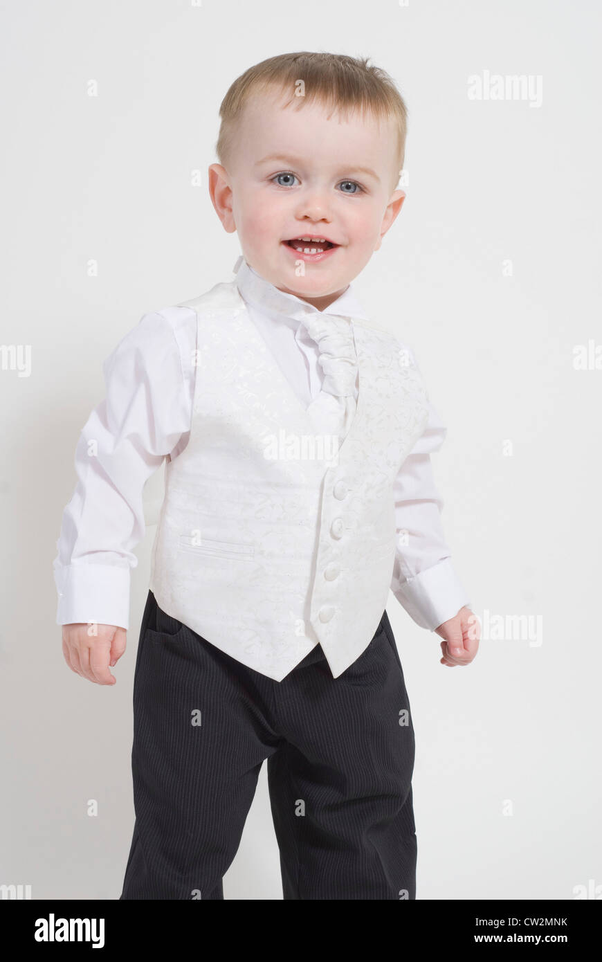 Little Boy, Toddler, Dressed up in Smart Suit & Waistcoat Smiling