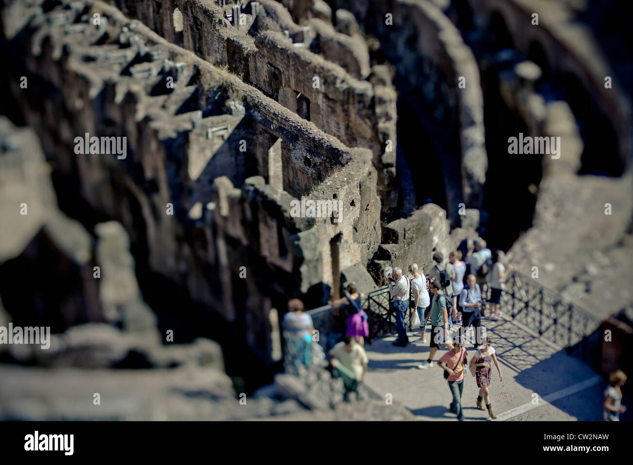 Tourists visiting the Colosseum, Rome, Italy Stock Photo