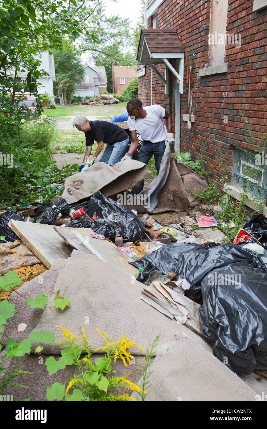 Detroit, Michigan Members of the Three Mile Block Club cut weeds and
