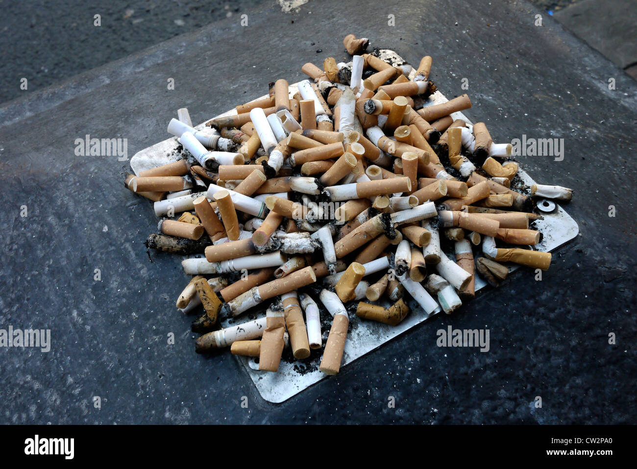 Stubbed out cigarette butts Stock Photo - Alamy