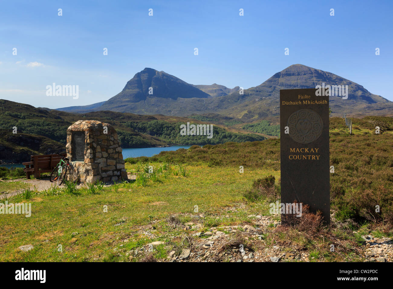 Celtic stone marking gateway to Mackay Country homeland with view to Quinag mountain range Assynt Sutherland Scotland UK Britain Stock Photo