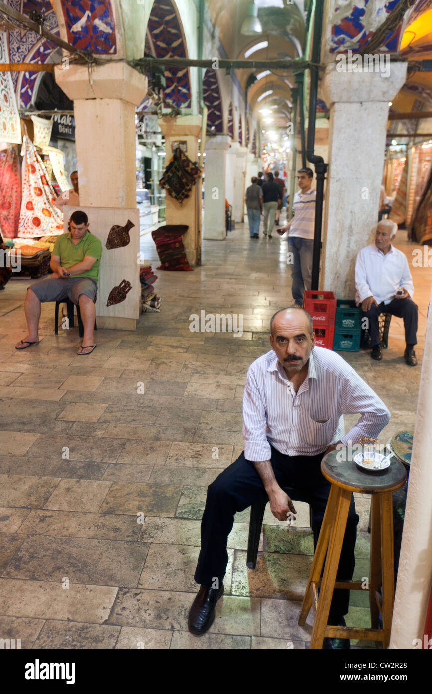 Turkish man at  Grand Bazaar covered market in Istanbul, Turkey Stock Photo