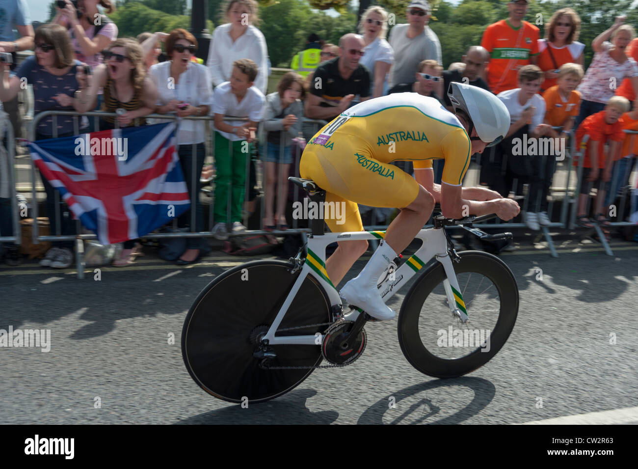 Michael Rogers racing in the London 2012 Olympic Mens Time Trial road cycling - crossing Kingston Bridge Stock Photo