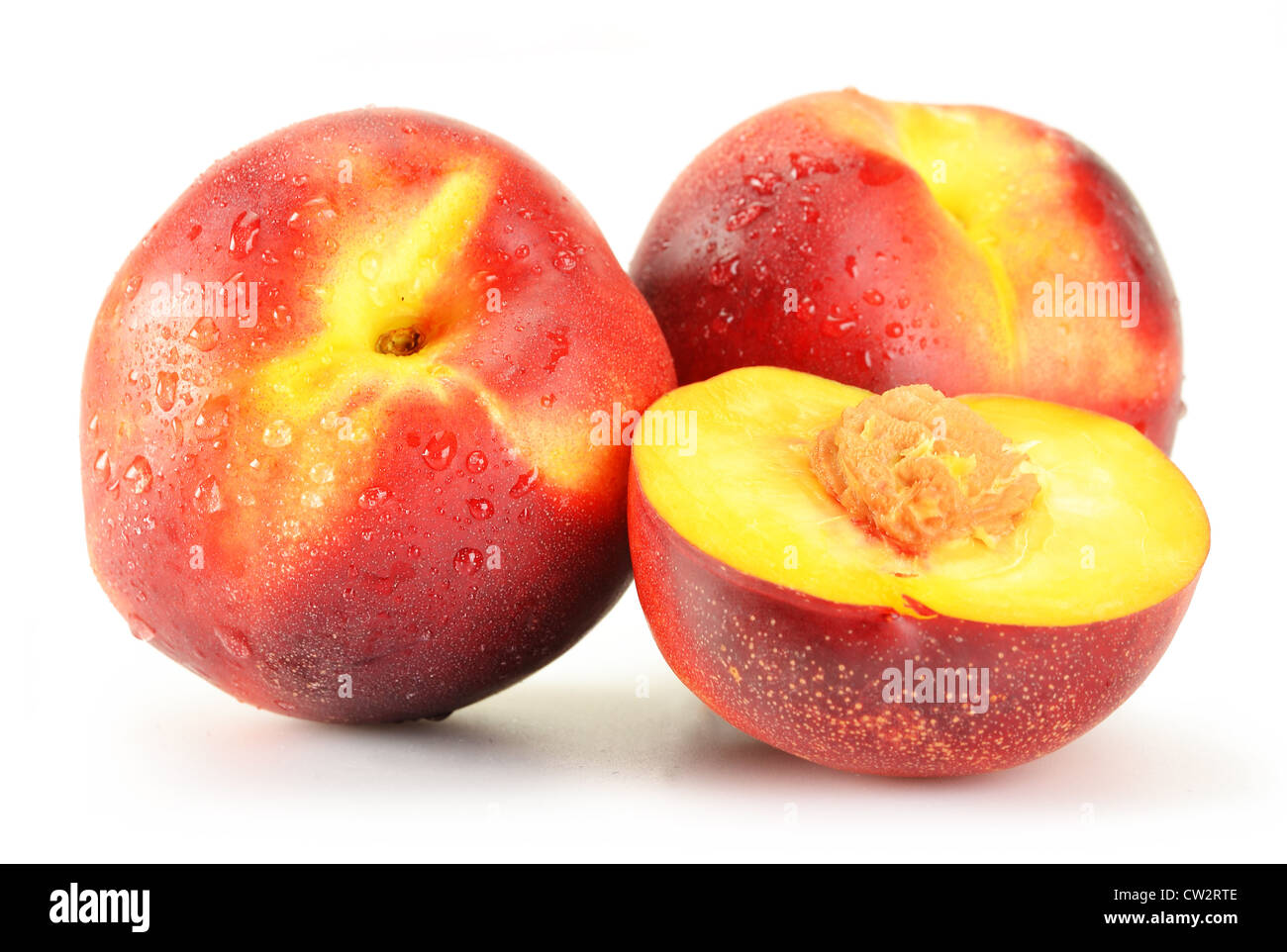 Fresh ripe peaches isolated on white Stock Photo - Alamy