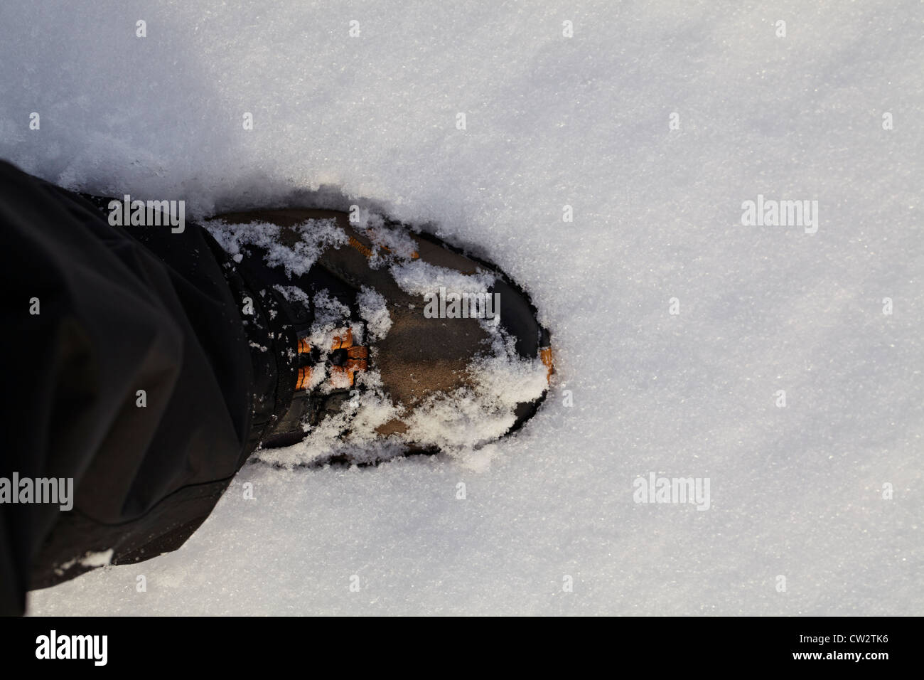 Walking boot in the snow Stock Photo