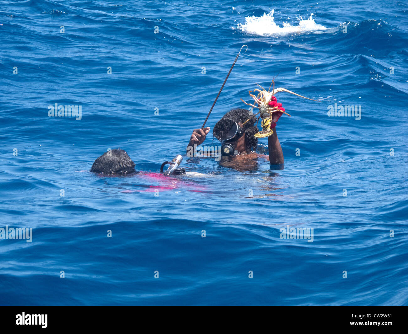 Lobster Divers in Honduras struggle with decompression illness brought on by diving too much and too deep. Stock Photo