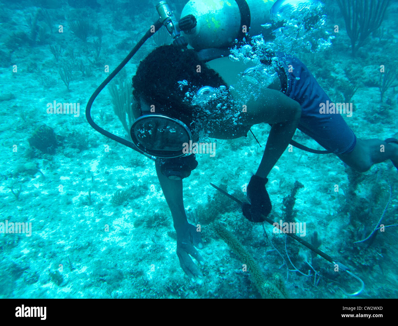 Lobster Divers in Honduras struggle with decompression illness brought on by diving too much and too deep. Stock Photo