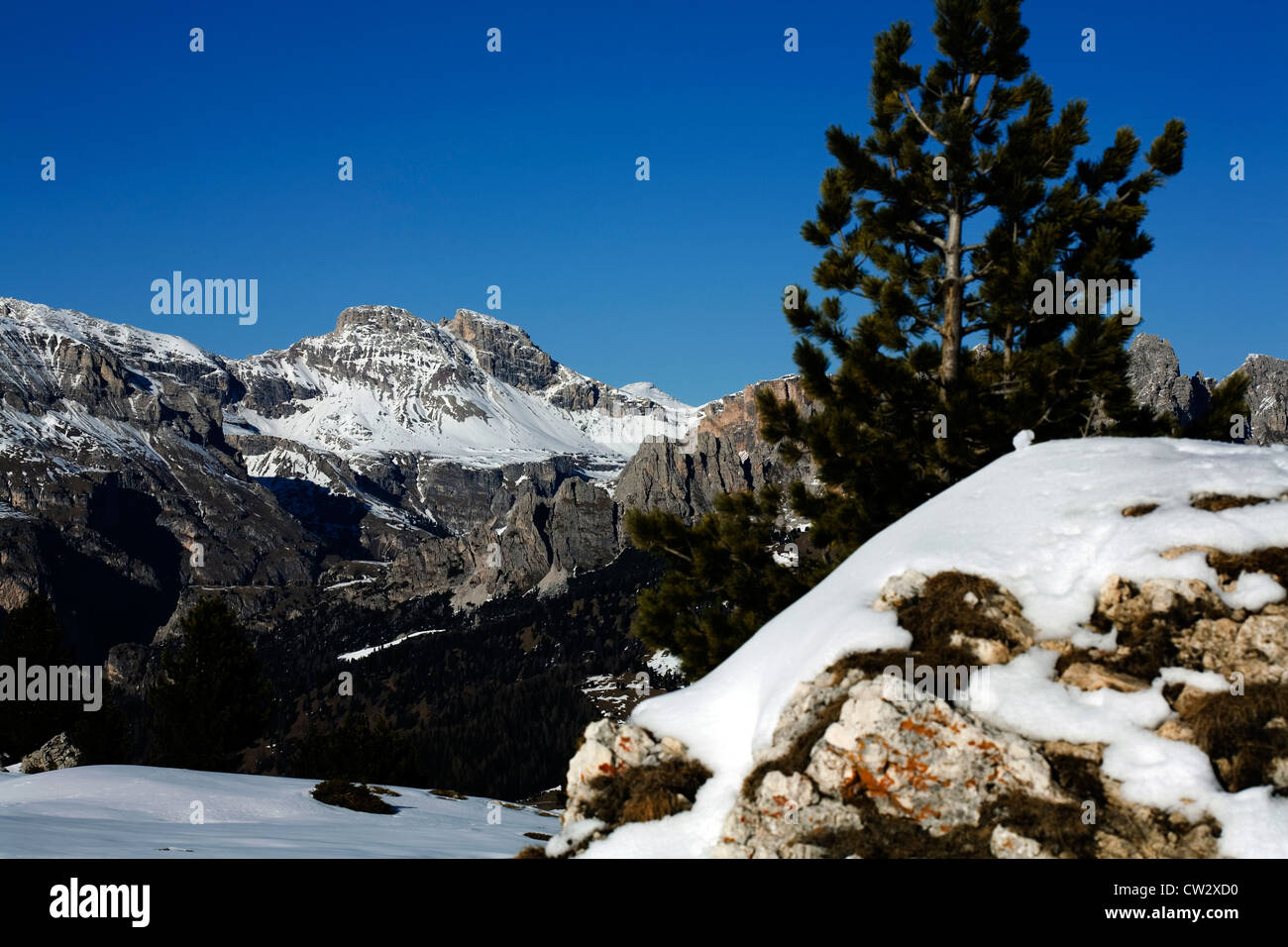Cliff faces and frozen waterfalls above The Edelweisstal above Colfosco winter  between Selva and Corvara Dolomites Italy Stock Photo