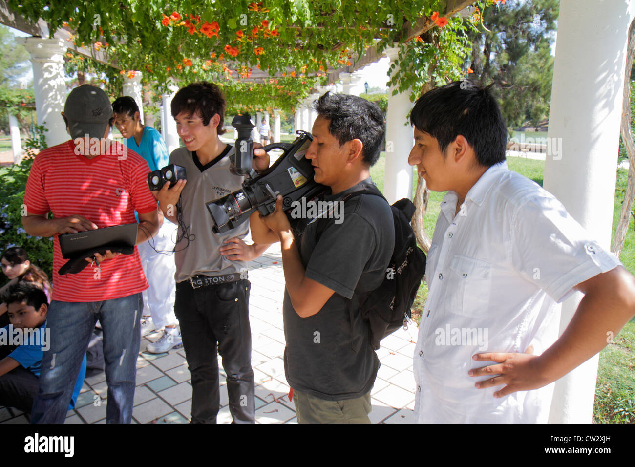 Kids filming adults hi-res stock photography and images - Alamy