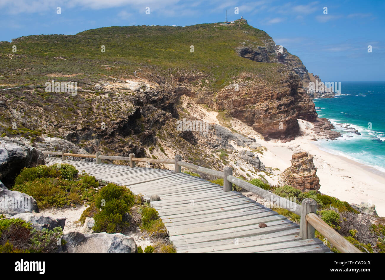Pathway along the craggy coastline overlooking Dias Beach to Cape Point, Table Mountain Nature Reserve, Cape Town, South Africa Stock Photo