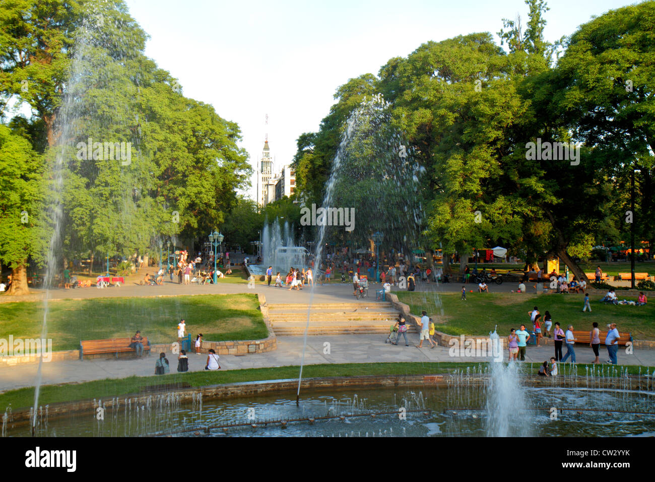 Mendoza Argentina,Plaza Independencia,public park,fountain,green space,crowd,crowded,water jet,public fountain,circular,circle,trees,vegetation,leisur Stock Photo