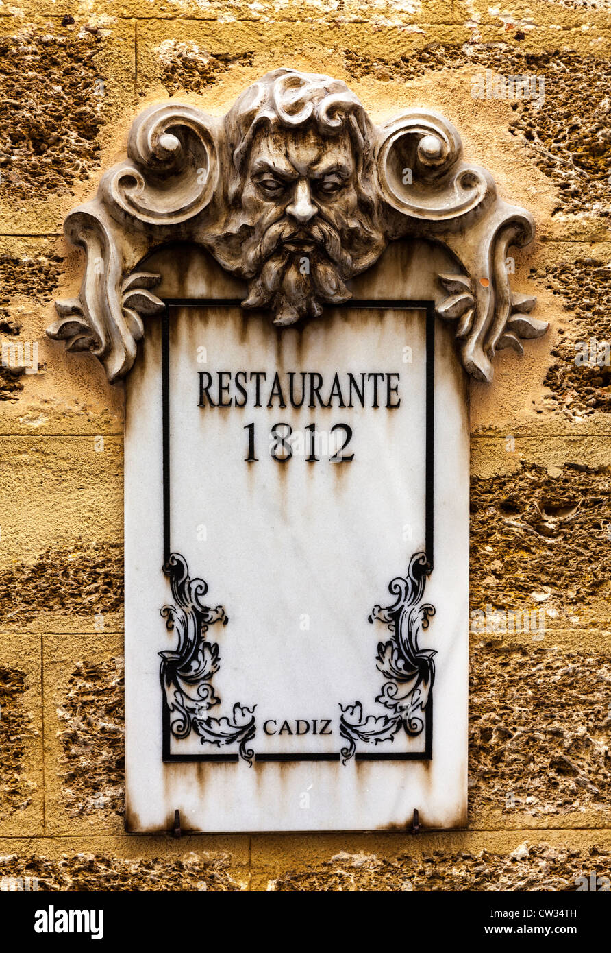 Cadiz, Andalusia, Spain, Europe. Old fashioned restaurant wall sign dated 1812. Stock Photo