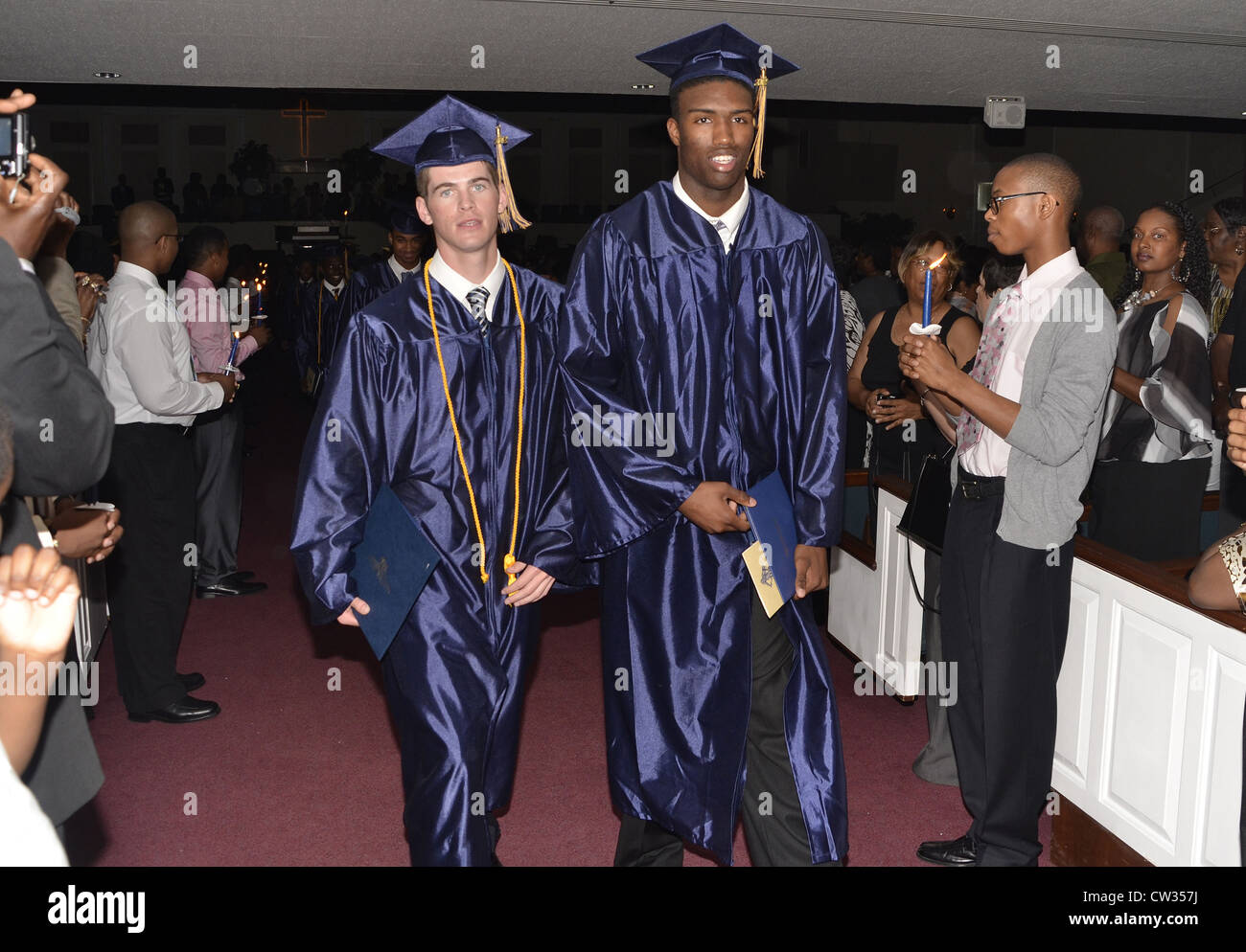 High school graduates with  their diplomas at a graduation ceremony in Forrstville, Maryland Stock Photo