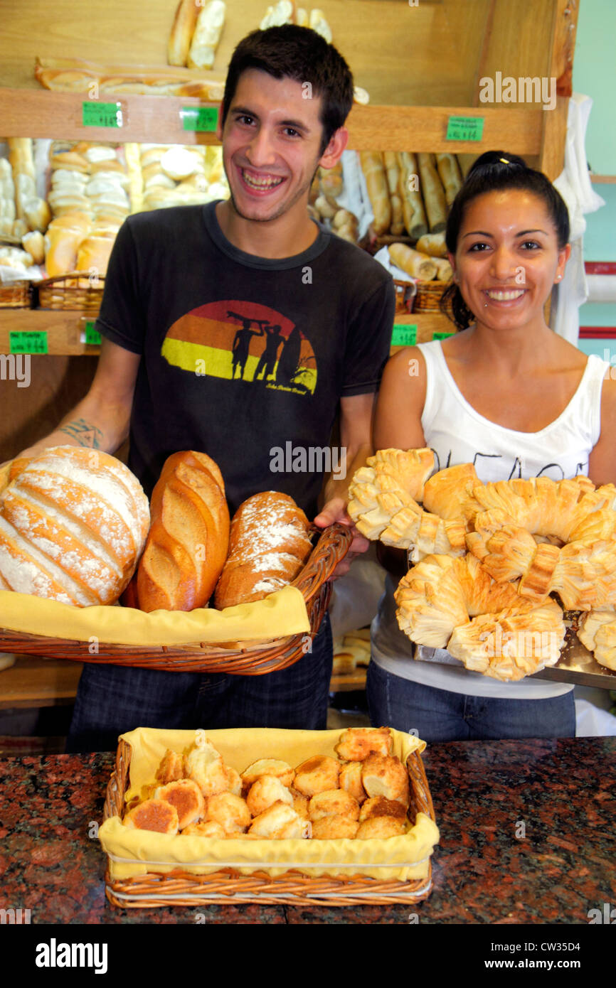 Buenos Aires Argentina,Avenida Rivadavia,bakery,baked goods,bread,Hispanic man men male,woman female women,young adult,attendant,counter clerk,basket, Stock Photo