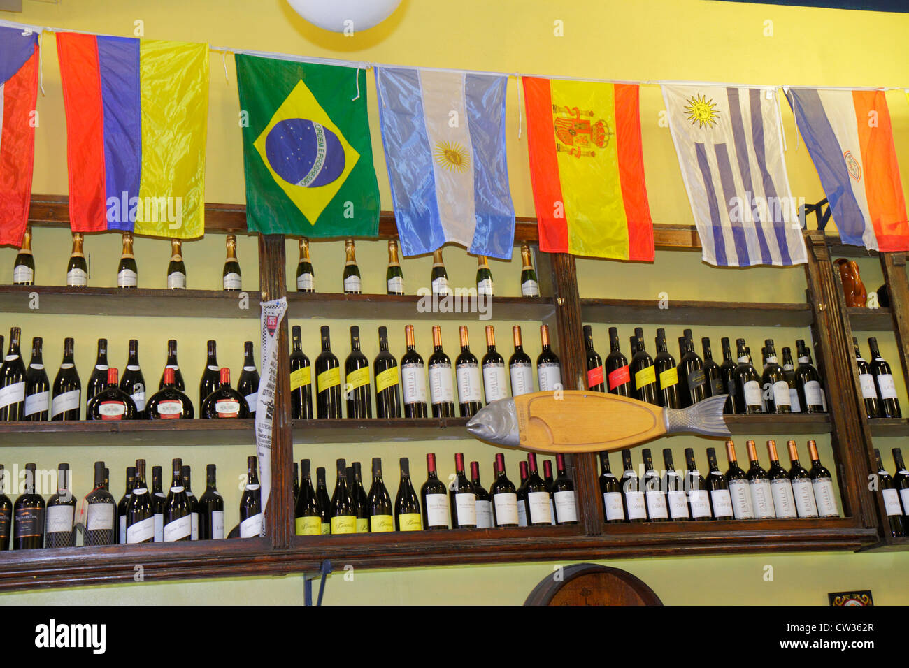 Buenos Aires Argentina,San Telmo,Avenida Defensa,wine shop,bottle,flags,shelf shelves shelving,product products display sale,visitors travel traveling Stock Photo